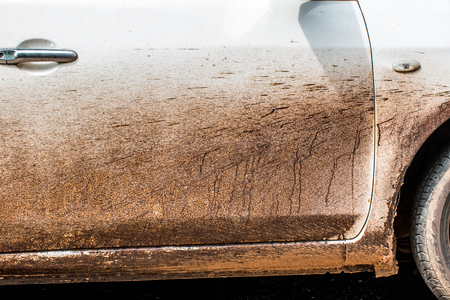 Asphalt on a white car difficult to clean dirty car,の写真素材