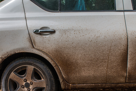 Asphalt on a white car difficult to clean dirty car,の写真素材