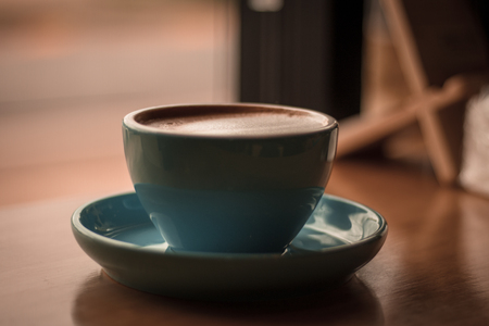 Hot Latte on the wooden tableの写真素材