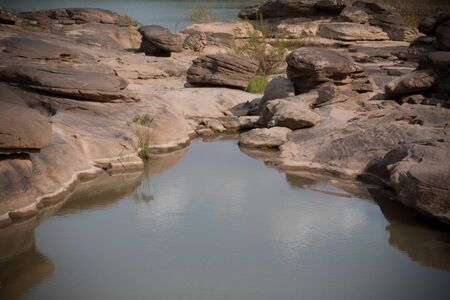 Beautiful amazing of rocks, Natural of rock canyon in mekhong river , Hat Chom Dao, Ubon Ratchathani province, North east Thailandの写真素材