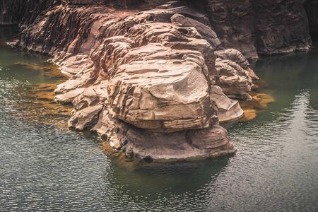 Beautiful amazing of rocks, Natural of rock canyon in mekhong river , Hat Chom Dao, Ubon Ratchathani province, North east Thailandの写真素材