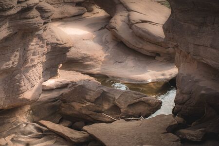 Beautiful amazing of rocks, Natural of rock canyon in mekhong river , Hat Chom Dao, Ubon Ratchathani province, North east Thailandの写真素材