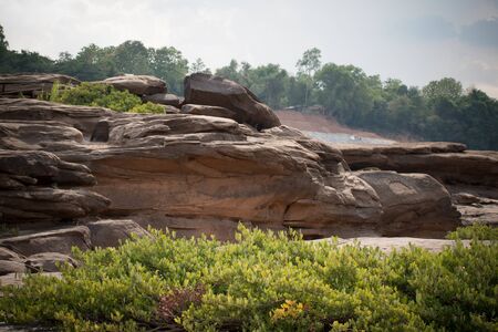 Beautiful amazing of rocks, Natural of rock canyon in mekhong river , Hat Chom Dao, Ubon Ratchathani province, North east Thailandの写真素材