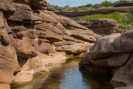 Beautiful amazing of rocks, Natural of rock canyon in mekhong river , Hat Chom Dao, Ubon Ratchathani province, North east Thailandの写真素材