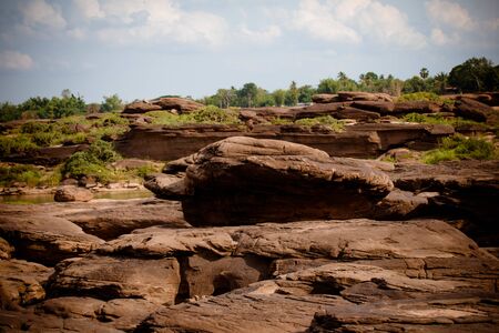 Beautiful amazing of rocks, Natural of rock canyon in mekhong river , Hat Chom Dao, Ubon Ratchathani province, North east Thailandの写真素材