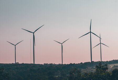 Wind turbines on land field with  sky backgroundの写真素材