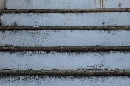 Abstract background of Old Concrete stairs.  concrete staircase with old dry leaves.の写真素材