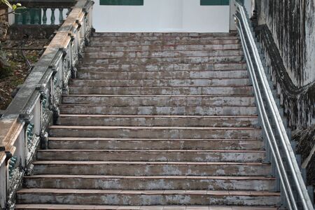 Abstract background of Old Concrete stairs.  concrete staircase with old dry leaves.の写真素材