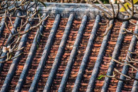 Ancient roof structure tile is an , traditional roof tile and is still in use in the Asian regionの写真素材
