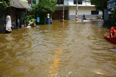 Street entrance to the village was flooded のeditorial素材