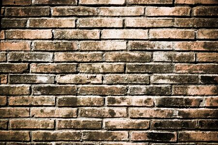 Old of concrete orange color blocks wall texture background.の写真素材