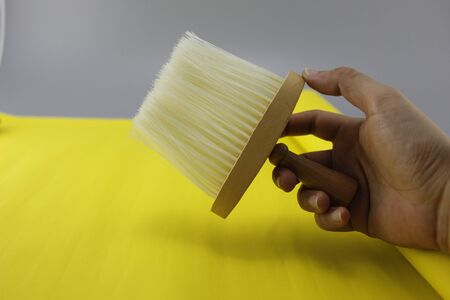 Large hair brush Used for rounding the hair for customers. Place on a yellow background.