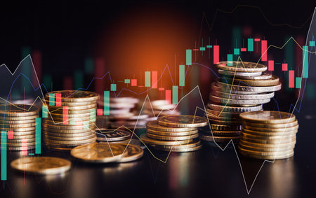 Double exposure of coin stack with financial graph and stock market or forex trading graph and candlestick chart suitable for financial investment concept.の写真素材