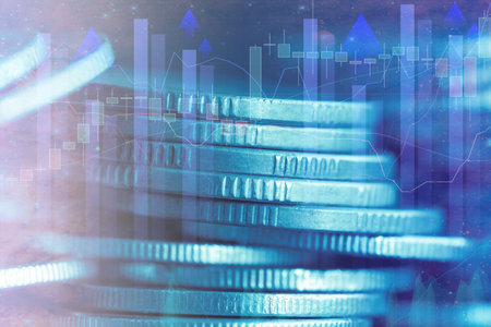 Double exposure of coin stack with financial graph and stock market or forex trading graph and candlestick chart suitable for financial investment concept.の写真素材