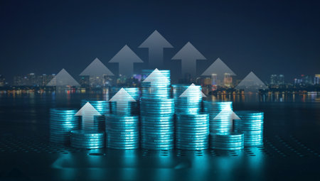 Double exposure of coin stacks with financial graph and cityscape background.の写真素材