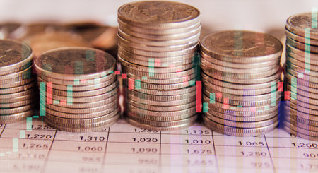 Coins stacked on each other in different positions. Financial background.の写真素材