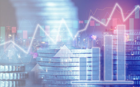 Double exposure of coin stack with financial graph and cityscape background, business and financial concept idea.の写真素材