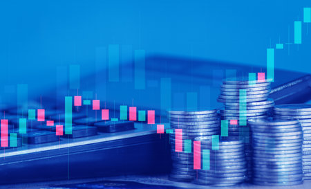 Double exposure of coin stack and graph stock market or forex trading graph for financial investment concept idea.の写真素材