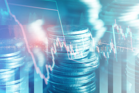 Double exposure of coin stack with financial graph and stock market or forex trading graph for financial investment concept.の写真素材