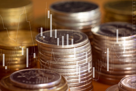 Investment concept, Coins with stock market graph background, business ideaの写真素材