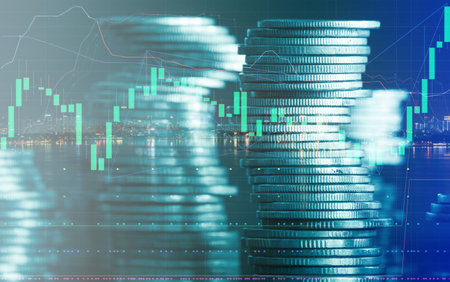 Double exposure of coin stack and stock market graph on LED background.の写真素材