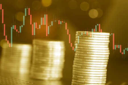 Investment concept, Coins graph stock market financial on LED background.の写真素材