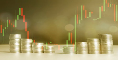 Investment concept, Coins graph stock market financial, coin stack on the table, business idea.の写真素材