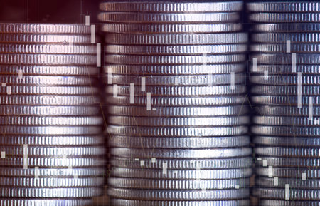 Stacks of silver coins, finance and banking concept. Abstract background.の写真素材