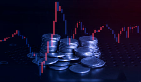 Investment concept, Coins graph stock market financial on LED background.の写真素材