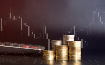 Investment concept, Coins graph stock market on dark background, business ideaの写真素材