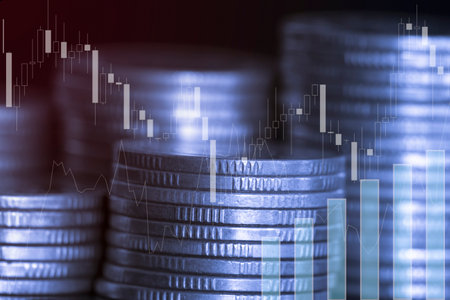 Double exposure of coin stack with financial graph and stock market or forex trading graph for financial investment concept idea.の写真素材