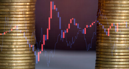 Investment concept, Coins graph stock market financial on LED background.の写真素材