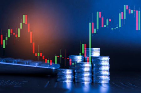 Double exposure of coin stack with stock market or forex trading graph and candlestick chart suitable for financial investment concept.の写真素材