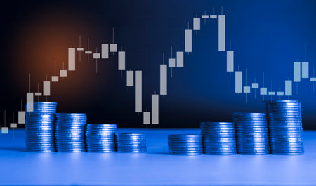 Coins stacks with stock market graph background, business financial concept idea.の写真素材