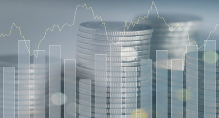 Double exposure of coin stack and graph stock market or forex trading and investment concept.の写真素材