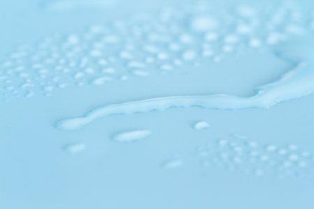 close up of water drops on blue background. shallow depth of fieldの写真素材