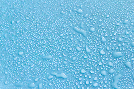 Water drops on blue background. Water drops on blue background. Water drops on blue backgroundの写真素材