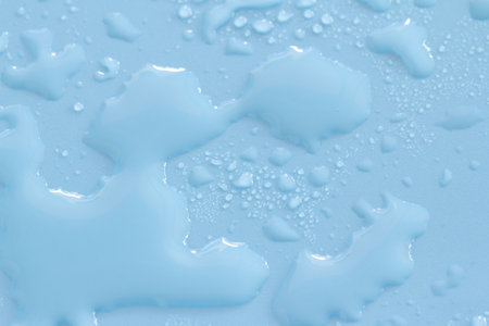 Water drops on blue background. Water drops on blue background. Water drops on blue backgroundの写真素材