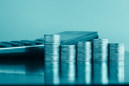 Coins stacked on each other in different positions. Financial concept.の写真素材