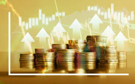 Double exposure of coin stack with financial graph and LED light bokeh background, business and finance concept idea.の写真素材