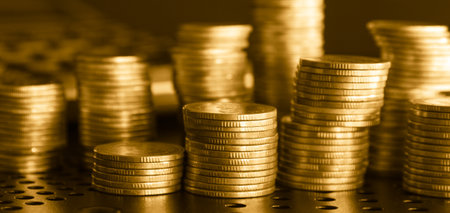 Stacks of gold coins, business and finance concept. Selective focus.の写真素材