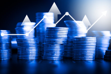 Stacks of coins with financial graph background, business and finance concept idea.
