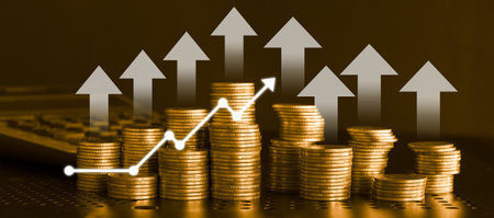 Stacks of coins with increasing arrow graph, business and financial conceptの写真素材