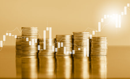 Double exposure of coin stack with stock market graph and candle stick, business and financial concept idea.の写真素材