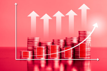 Investment concept, Coins graph stock market financial on red background.の写真素材
