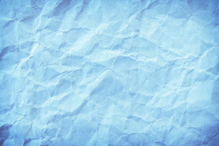 Blue crumpled paper texture background. Copy space for design.の写真素材