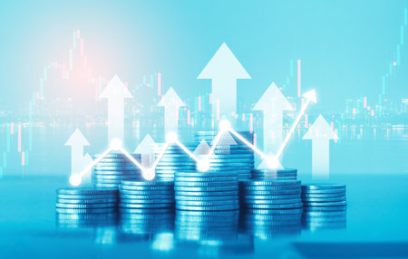 Double exposure of coin stack with graph stock market for financial and business concept idea.の写真素材