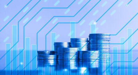 Stacks of coins with financial graph background, business and finance concept idea.の写真素材