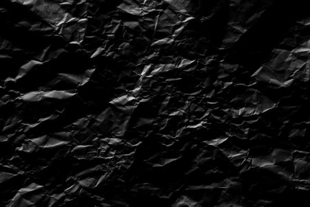 Black crumpled paper texture background. Abstract black and white background.の写真素材