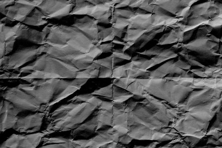 Crumpled paper texture background. Black crumpled paper.の写真素材